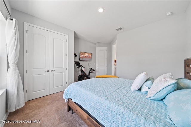 1160 Larkspur St SE, Palm Bay, FL 32909 - bedroom featuring light colored carpet, a closet, and recessed lighting