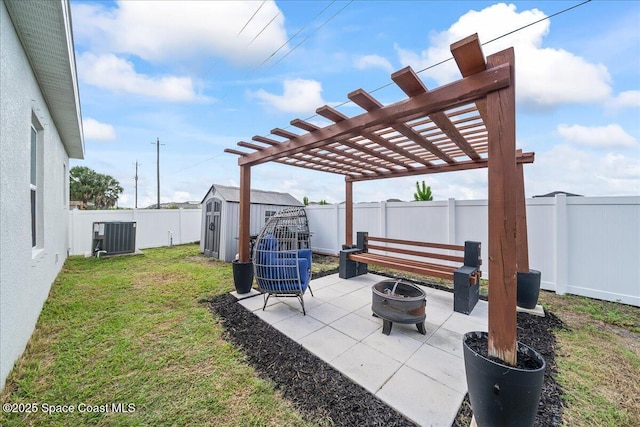 1160 Larkspur St SE, Palm Bay, FL 32909 - view of yard featuring a fire pit, a patio, central air condition unit, and a pergola