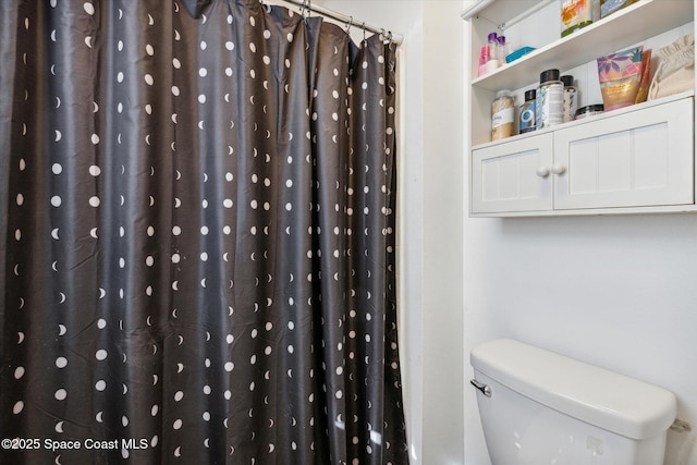 5060 Spinet Dr, Melbourne, FL 32940 - full bath featuring toilet and a shower with shower curtain