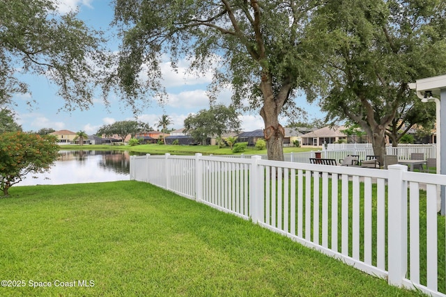 5060 Spinet Dr, Melbourne, FL 32940 - view of yard with a water view and a residential view