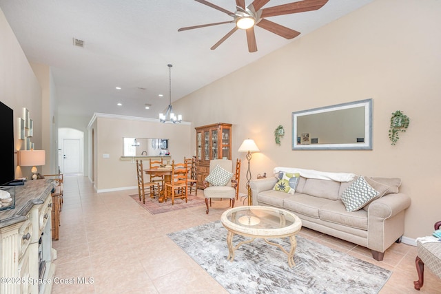 2009 Tullagee Ave, Melbourne, FL 32940 - living area with ceiling fan, arched walkways, light tile patterned floors, a chandelier, and recessed lighting