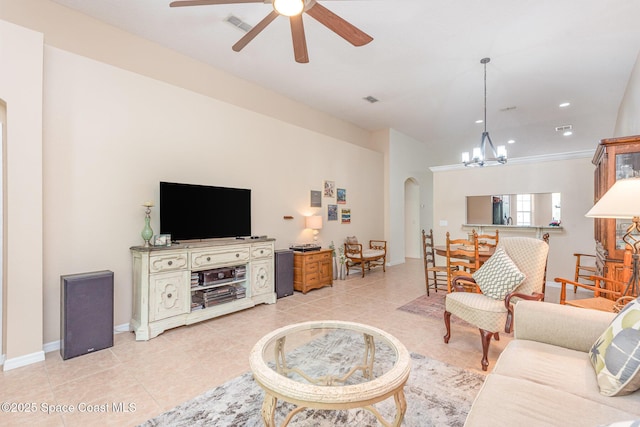 2009 Tullagee Ave, Melbourne, FL 32940 - living area featuring arched walkways, a ceiling fan, light tile patterned flooring, a chandelier, and recessed lighting