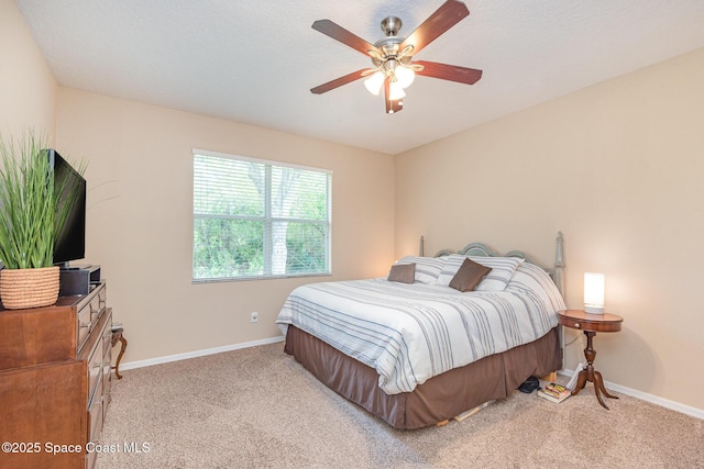 2009 Tullagee Ave, Melbourne, FL 32940 - carpeted bedroom featuring baseboards and a ceiling fan