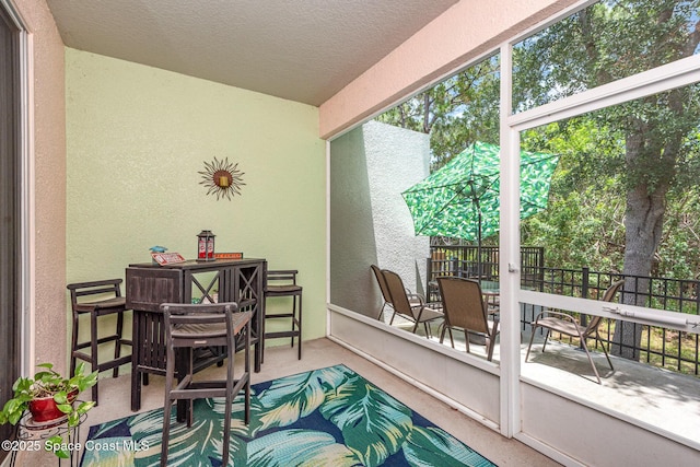 2009 Tullagee Ave, Melbourne, FL 32940 - sunroom featuring outdoor dining space