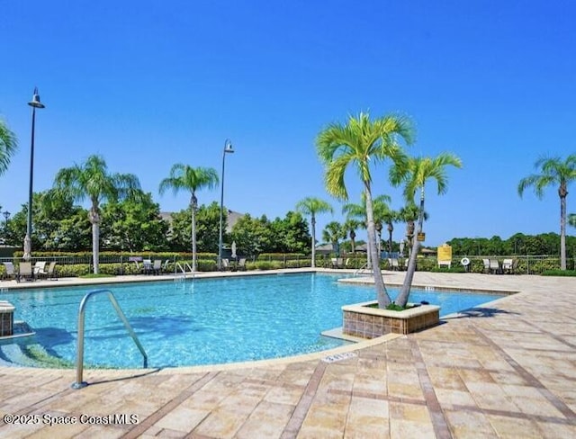 2009 Tullagee Ave, Melbourne, FL 32940 - community pool with a patio area