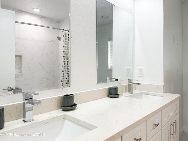 234 Micanopy Ct, Indian Harbour Beach, FL 32937 - bathroom featuring double vanity and a shower with shower curtain