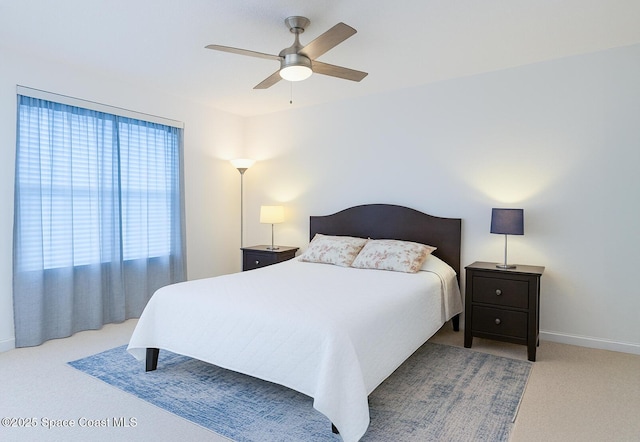 234 Micanopy Ct, Indian Harbour Beach, FL 32937 - carpeted bedroom featuring baseboards and a ceiling fan