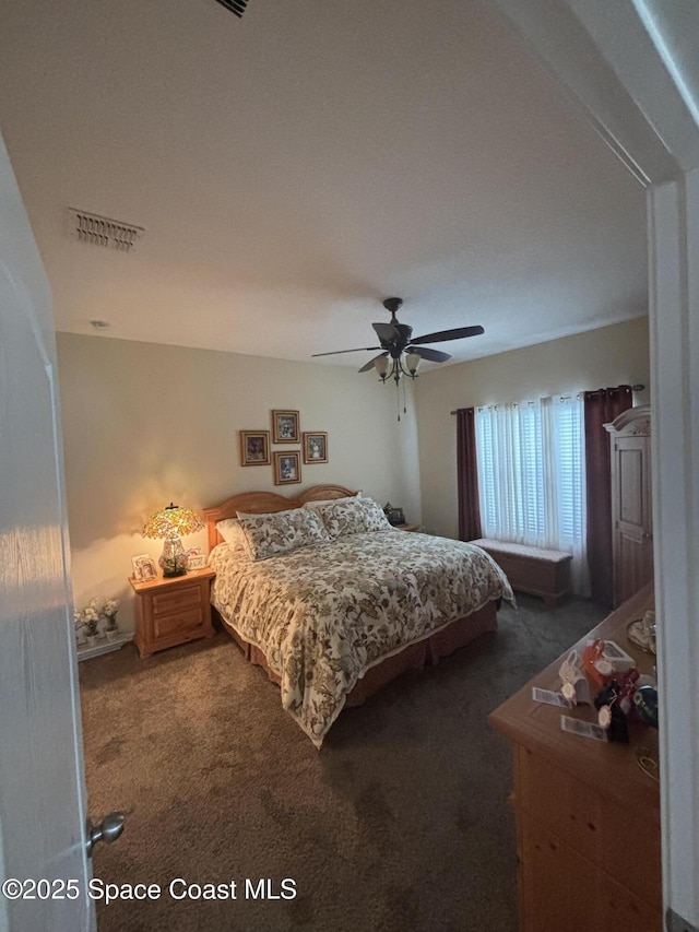 5908 Van Ness Dr, Melbourne, FL 32940 - bedroom featuring carpet flooring and ceiling fan