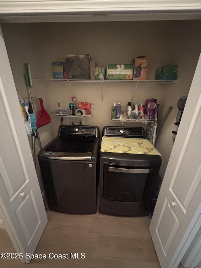 5908 Van Ness Dr, Melbourne, FL 32940 - laundry room with washing machine and clothes dryer