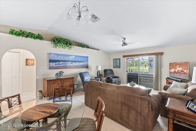 1776 Sawgrass Dr SW, Palm Bay, FL 32908 - living room with vaulted ceiling, arched walkways, a ceiling fan, a chandelier, and light colored carpet