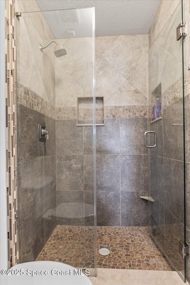 1776 Sawgrass Dr SW, Palm Bay, FL 32908 - bathroom featuring a shower stall