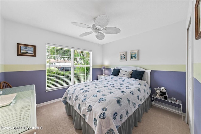 1776 Sawgrass Dr SW, Palm Bay, FL 32908 - carpeted bedroom with baseboards and ceiling fan