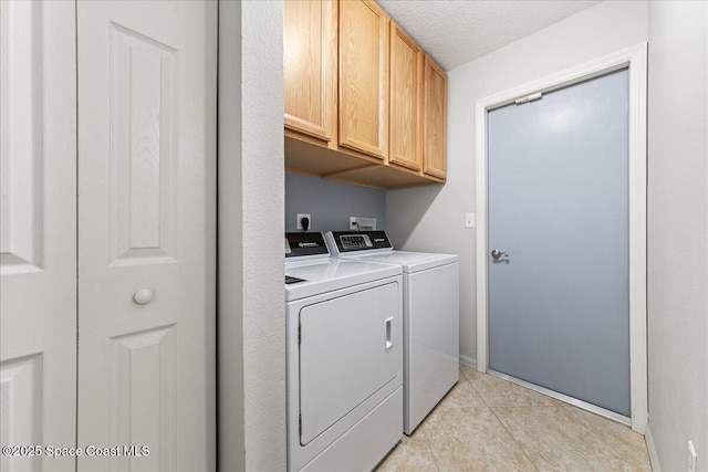 1776 Sawgrass Dr SW, Palm Bay, FL 32908 - laundry area with cabinet space, washing machine and dryer, baseboards, and light tile patterned flooring