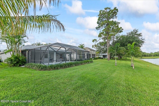 1776 Sawgrass Dr SW, Palm Bay, FL 32908 - view of green lawn with a water view and glass enclosure