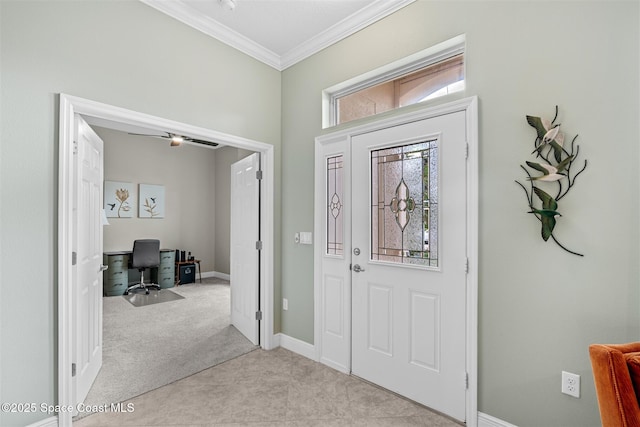 3360 Thurloe Dr, Rockledge, FL 32955 - foyer with crown molding, light colored carpet, and baseboards
