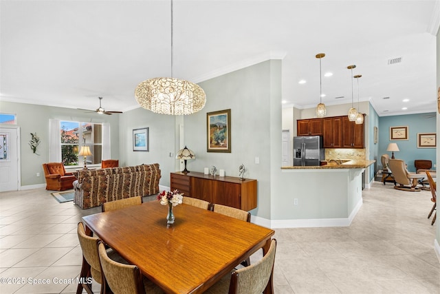 3360 Thurloe Dr, Rockledge, FL 32955 - dining space with crown molding, light tile patterned floors, ceiling fan, recessed lighting, and baseboards