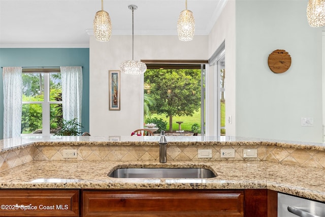 3360 Thurloe Dr, Rockledge, FL 32955 - kitchen featuring a sink, dishwasher, light stone countertops, plenty of natural light, and ornamental molding