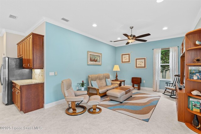 3360 Thurloe Dr, Rockledge, FL 32955 - living area featuring ornamental molding, recessed lighting, ceiling fan, baseboards, and light tile patterned flooring