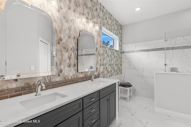 3360 Thurloe Dr, Rockledge, FL 32955 - full bathroom featuring double vanity, marble finish flooring, tile walls, a walk in shower, and a soaking tub