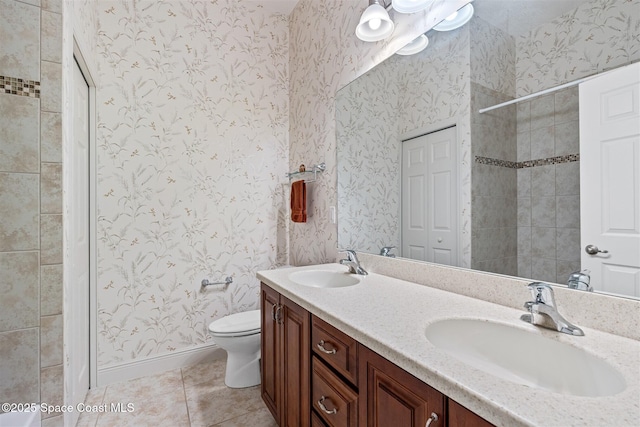 3360 Thurloe Dr, Rockledge, FL 32955 - full bath featuring tile patterned flooring, double vanity, toilet, and tiled shower
