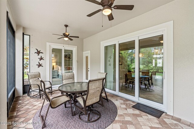 3360 Thurloe Dr, Rockledge, FL 32955 - sunroom / solarium featuring ceiling fan and outdoor dining space