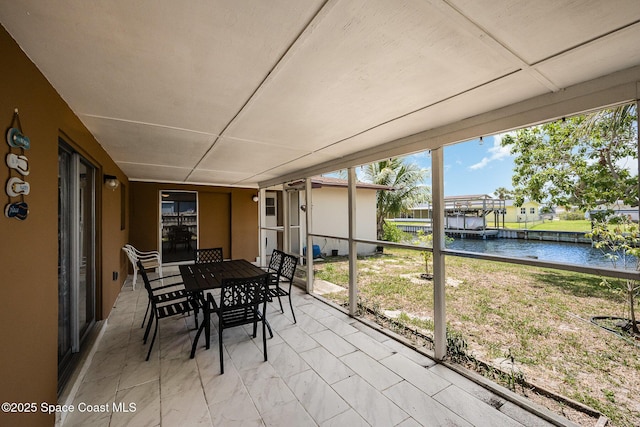 1505 W Central Ave, Merritt Island, FL 32952 - sunroom / solarium featuring a water view, healthy amount of natural light, and outdoor dining space
