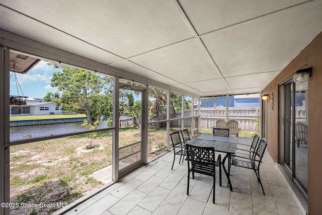 1505 W Central Ave, Merritt Island, FL 32952 - sunroom / solarium with outdoor dining space and a water view