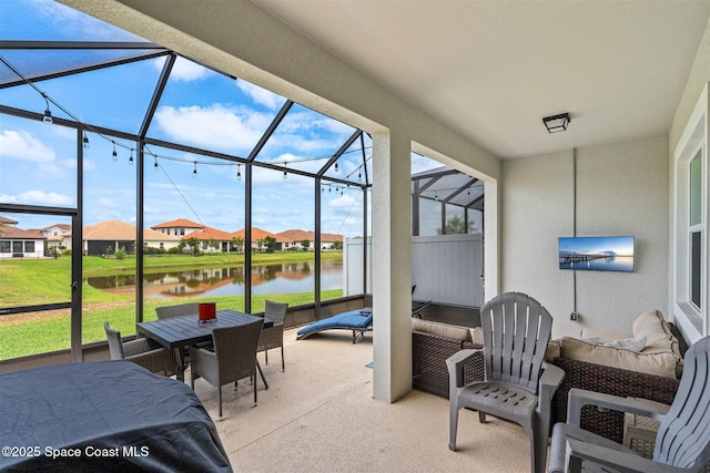 3039 Avalonia Dr, Melbourne, FL 32940 - view of patio / terrace with a residential view, glass enclosure, and outdoor dining space