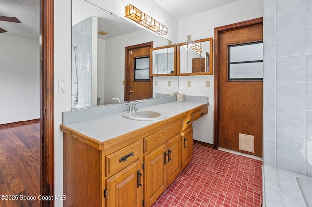 7001 Windover Way, Titusville, FL 32780 - bathroom with vanity and ceiling fan