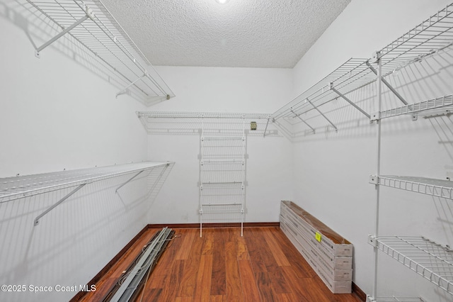 7001 Windover Way, Titusville, FL 32780 - spacious closet with wood finished floors