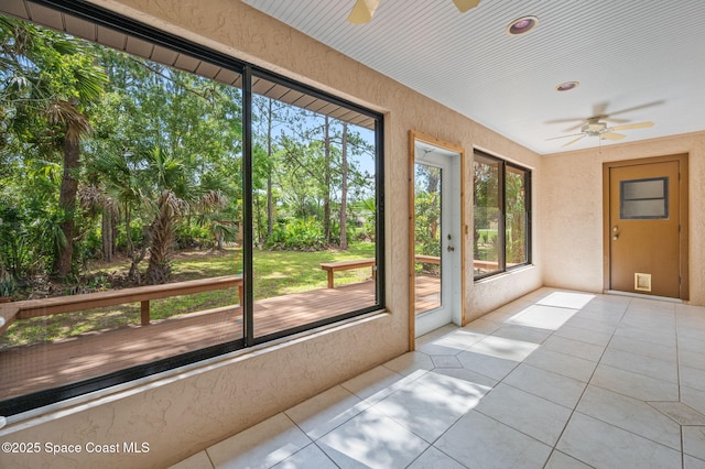 7001 Windover Way, Titusville, FL 32780 - unfurnished sunroom with a ceiling fan
