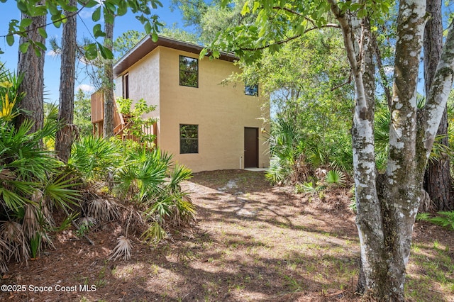 7001 Windover Way, Titusville, FL 32780 - view of front of house featuring stucco siding