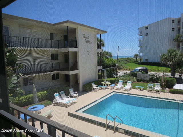 504 Fillmore Ave Unit B-8, Cape Canaveral, FL 32920 - community pool with a patio