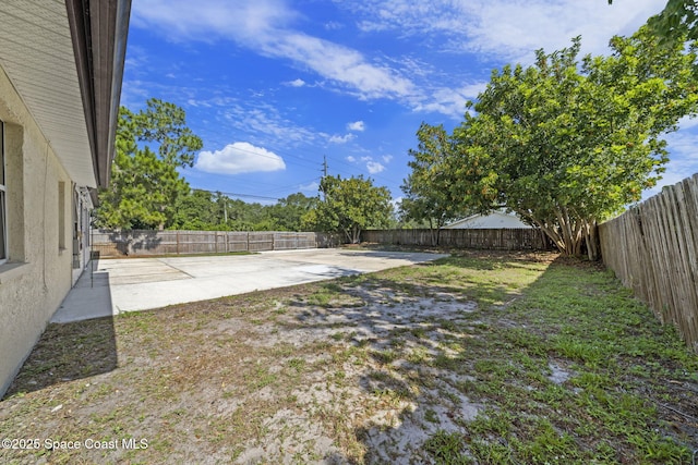 2036 Hogan Dr, Melbourne, FL 32935 - fenced backyard featuring a patio