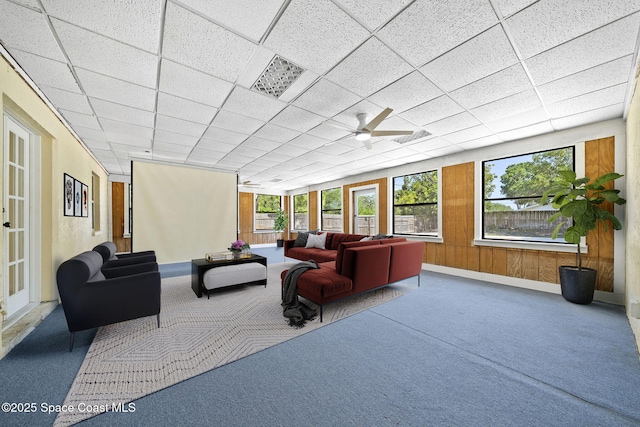 2036 Hogan Dr, Melbourne, FL 32935 - carpeted living room featuring ceiling fan and baseboards