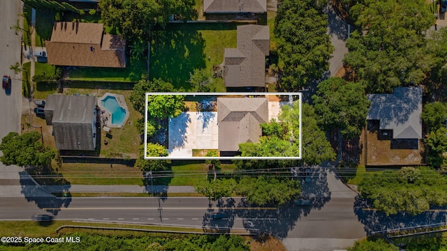 2036 Hogan Dr, Melbourne, FL 32935 - aerial view of property and surrounding area with property parcel outlined and a pool area