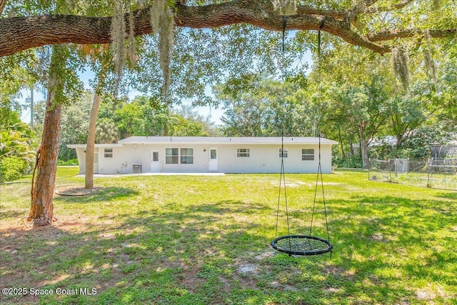 439 Blue Heron Rd, Melbourne Village, FL 32904 - rear view of house featuring stucco siding