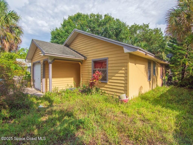 3625 2nd Ln, Vero Beach, FL 32968 - view of front of home with a garage