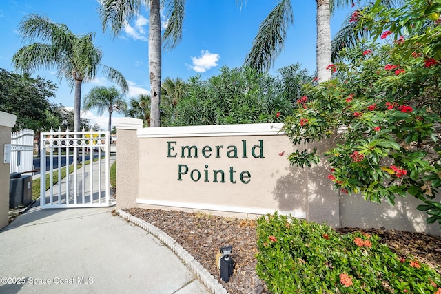 7701 Candlewick Dr, Melbourne, FL 32940 - community sign featuring a gate