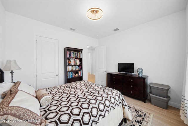 3234 Laming Way, Melbourne, FL 32940 - bedroom featuring light wood-style floors and baseboards