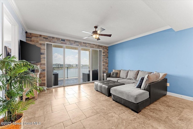 4125 W End Rd Unit 405, Cocoa Beach, FL 32931 - living room with ceiling fan, ornamental molding, baseboards, and a textured ceiling