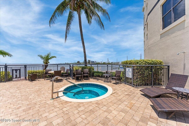4125 W End Rd Unit 405, Cocoa Beach, FL 32931 - view of swimming pool featuring a patio area