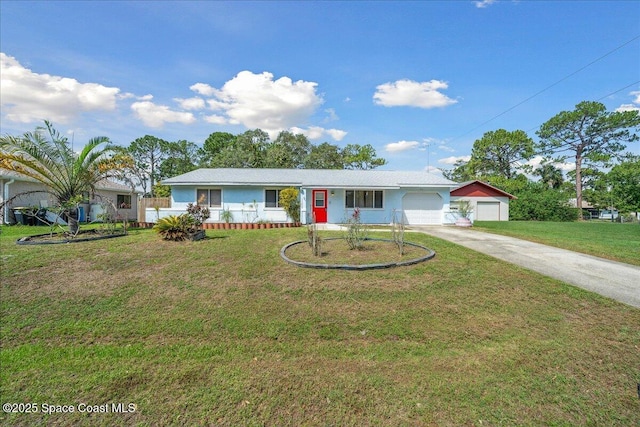 1750 Wapello Ave SE, Palm Bay, FL 32909 - ranch-style house with concrete driveway, a front lawn, and a garage