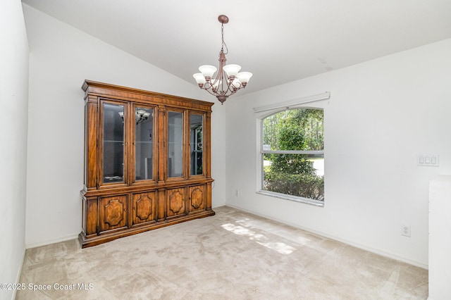 3220 Lowry Blvd SE, Palm Bay, FL 32909 - carpeted spare room featuring a chandelier, lofted ceiling, and baseboards