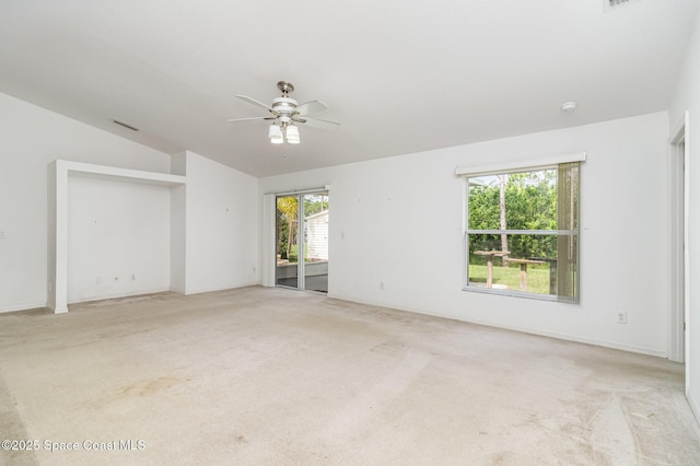 3220 Lowry Blvd SE, Palm Bay, FL 32909 - empty room featuring vaulted ceiling, a ceiling fan, and light colored carpet