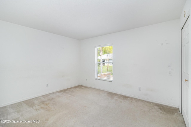 3220 Lowry Blvd SE, Palm Bay, FL 32909 - spare room with light carpet and baseboards