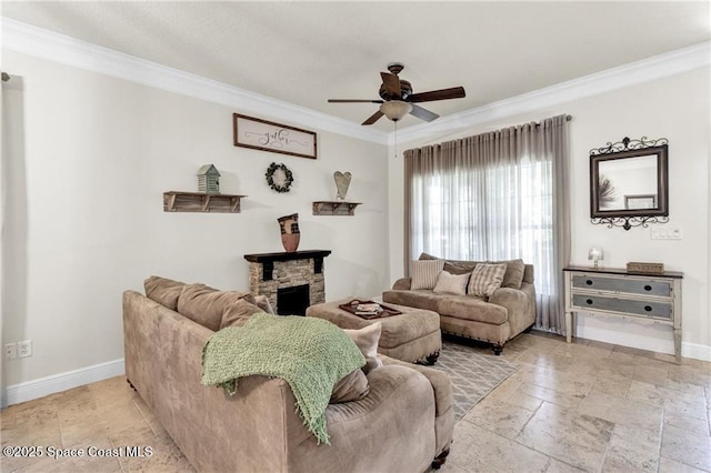 121 Amherst Ln, Sebastian, FL 32958 - living area featuring crown molding, a ceiling fan, stone tile flooring, baseboards, and a stone fireplace