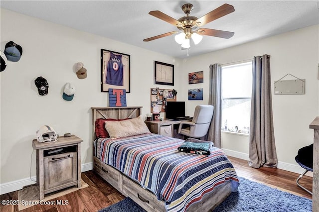 121 Amherst Ln, Sebastian, FL 32958 - bedroom with baseboards, wood finished floors, and ceiling fan