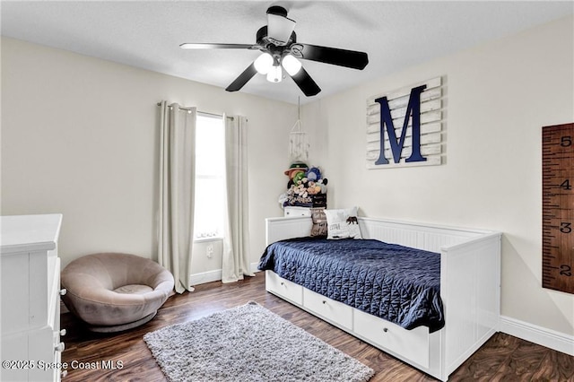 121 Amherst Ln, Sebastian, FL 32958 - bedroom featuring baseboards, ceiling fan, and dark wood-type flooring