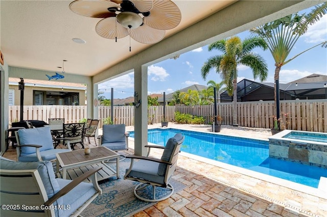 121 Amherst Ln, Sebastian, FL 32958 - view of pool featuring a fenced backyard, a patio area, a ceiling fan, a pool with connected hot tub, and outdoor dining area